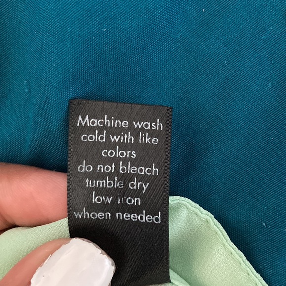 A light weight button down shirt. - Picture 4 of 4